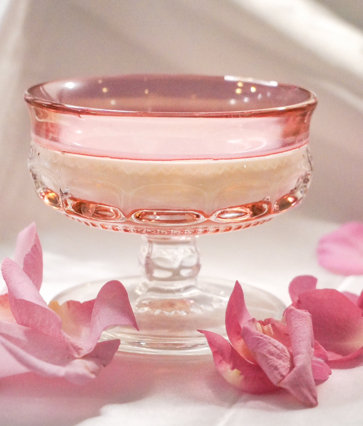 clear coupe glasses w/ pink rim