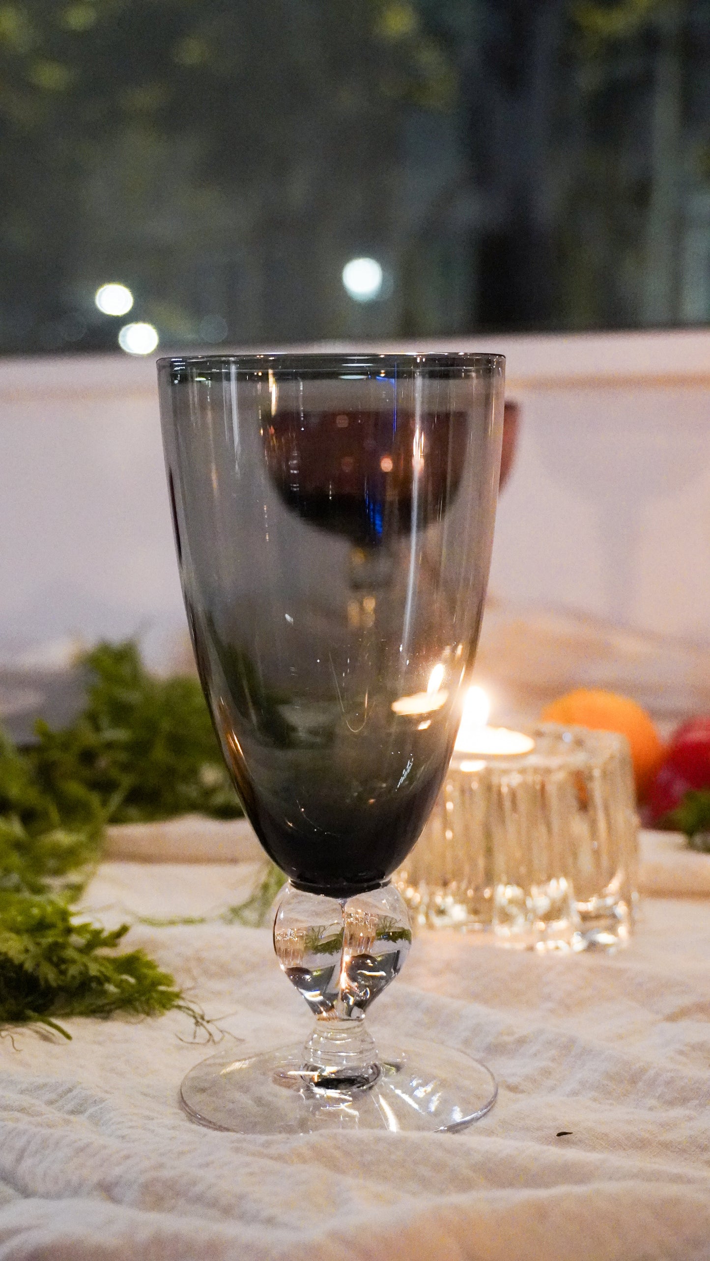 grey glasses w/ clear twisted stem