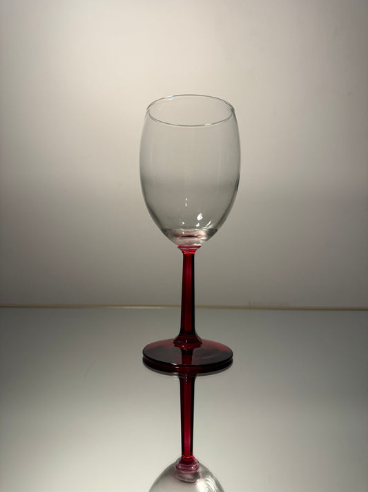 wine glass w/ red stem